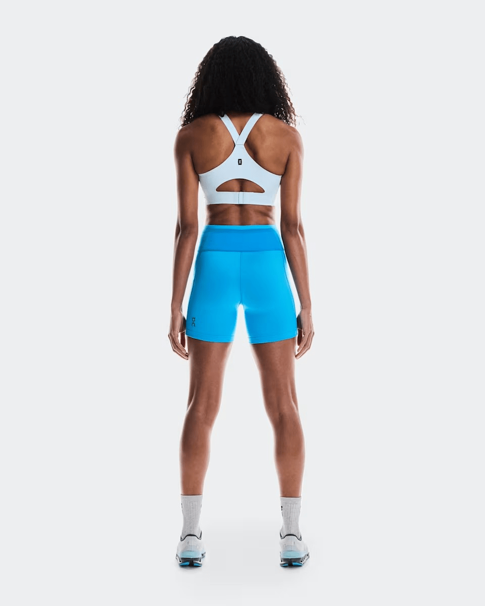 On Running Women's Performance Short Tights in Malibu - rear view showing high waist