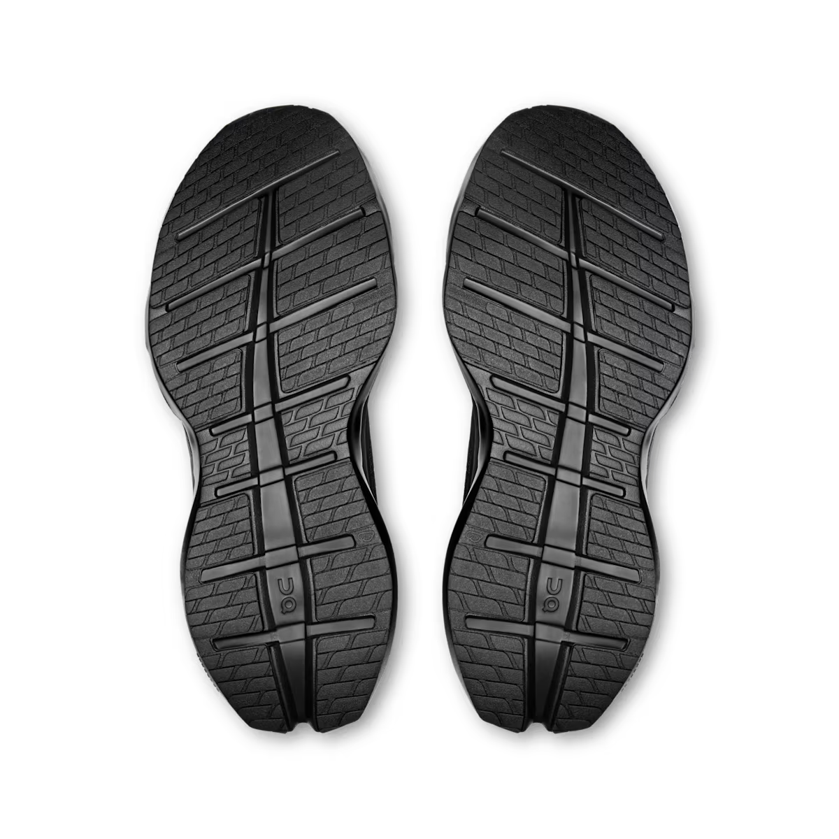 Outsoles of men's On Cloudrunner 3 Max running shoes in Black | Black, showing the road tread.