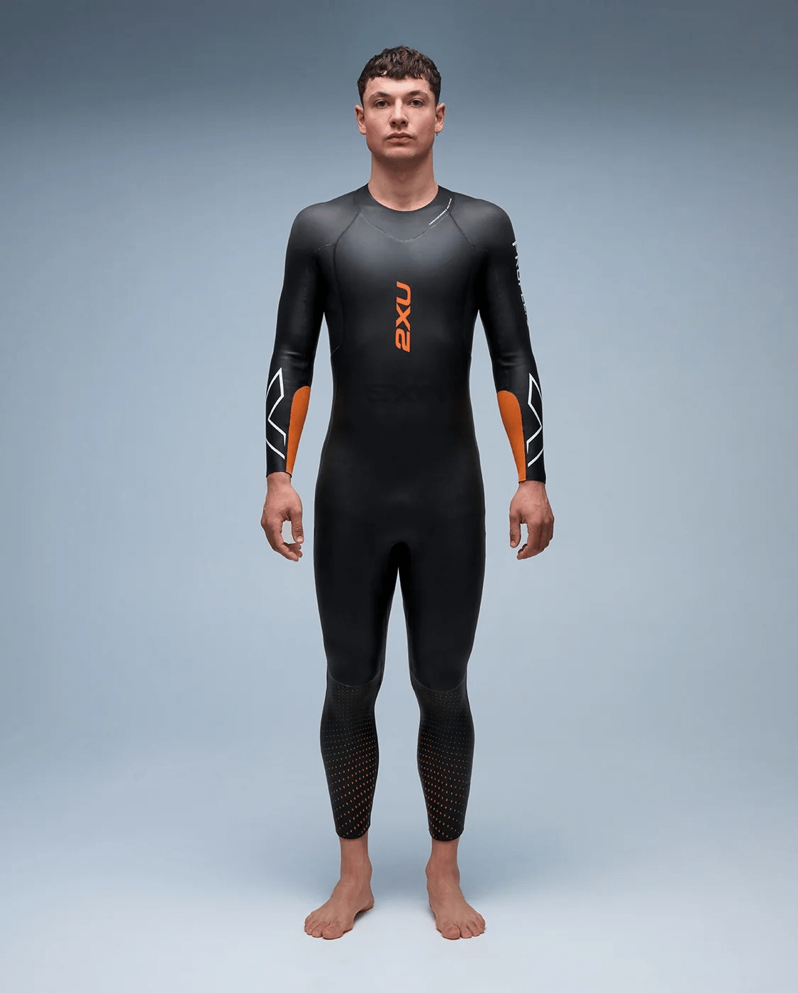 2XU Propel:1 men's full triathlon wetsuit in Black and Solar Orange.