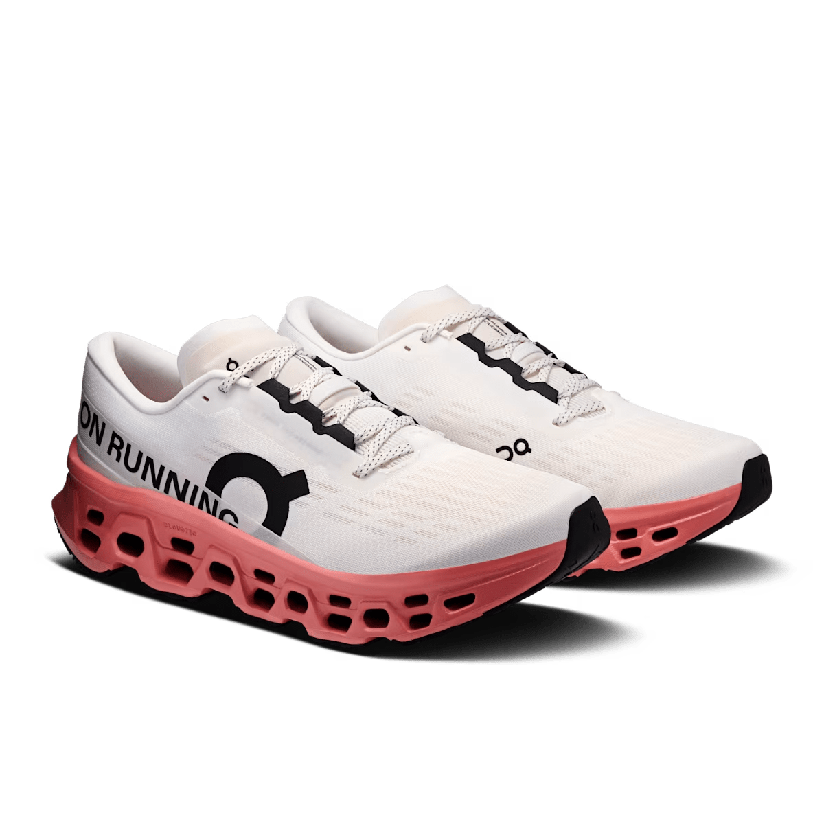 Pair of men’s On Cloudmonster 3 running shoes in Ivory/Dustrose, three-quarter view.
