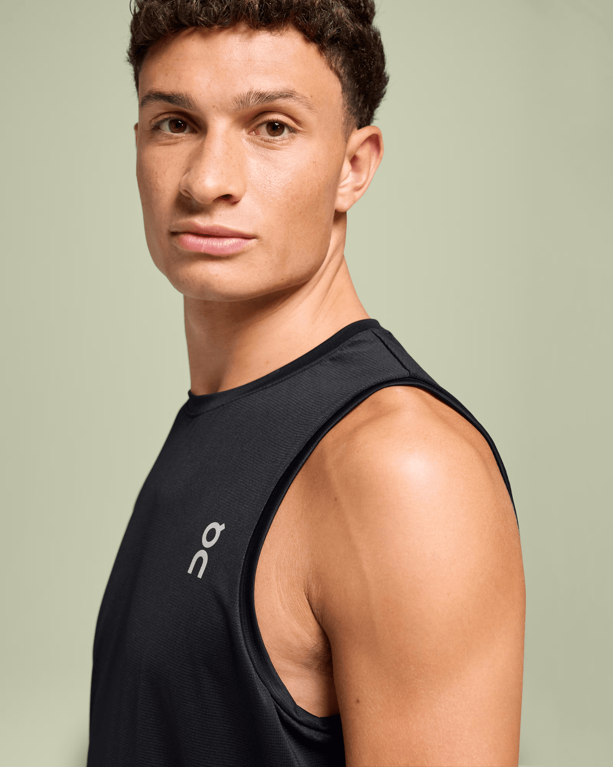 Black On Core Tank men's sleeveless top, regular fit for running and everyday wear.