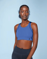 On Running Women's Performance Bra in Cobalt Navy - front view showing high neckline