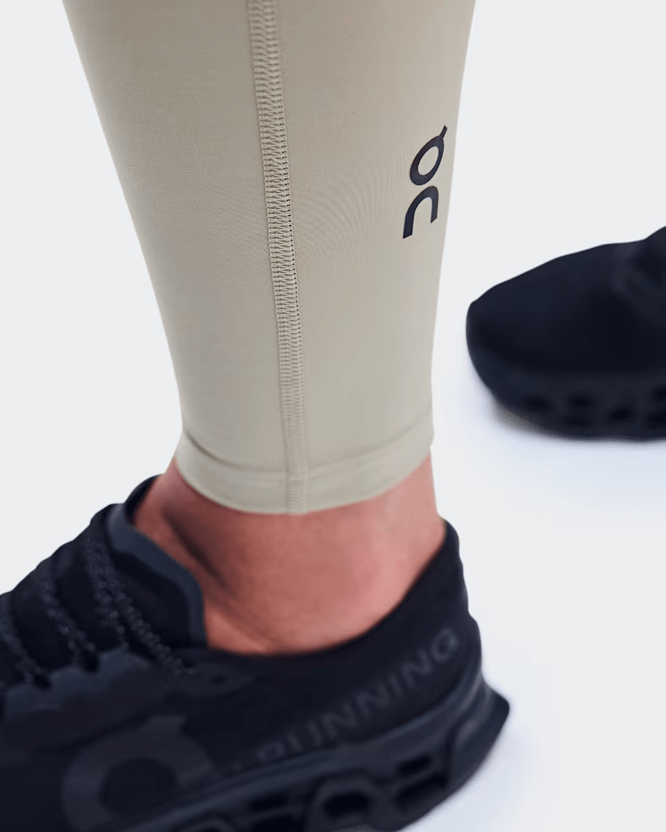 On women's Performance running tights – fabric and construction detail