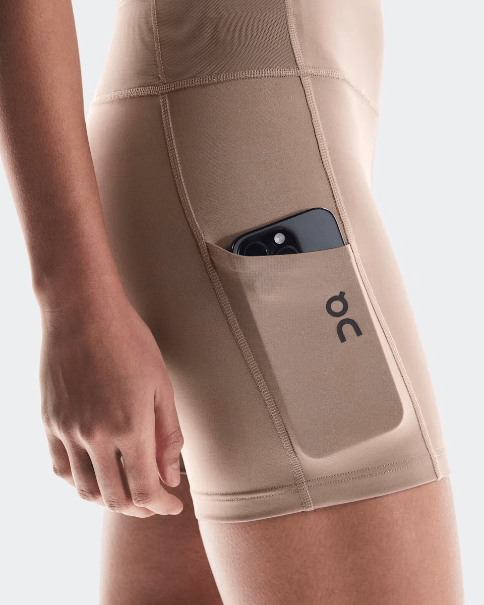 On Running Women's Performance Short Tights in Cinder - pocket detail