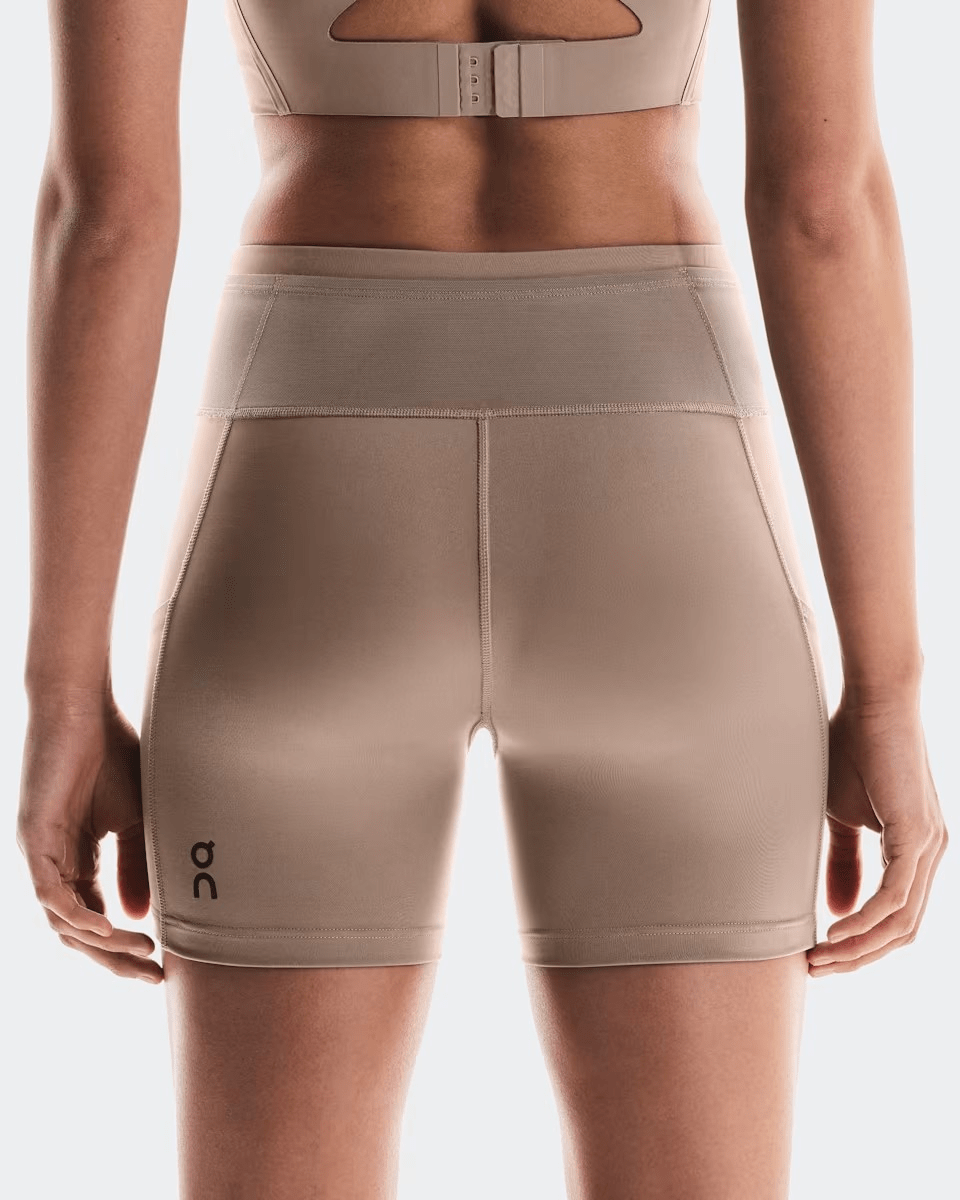 On Running Women's Performance Short Tights in Cinder - back vew
