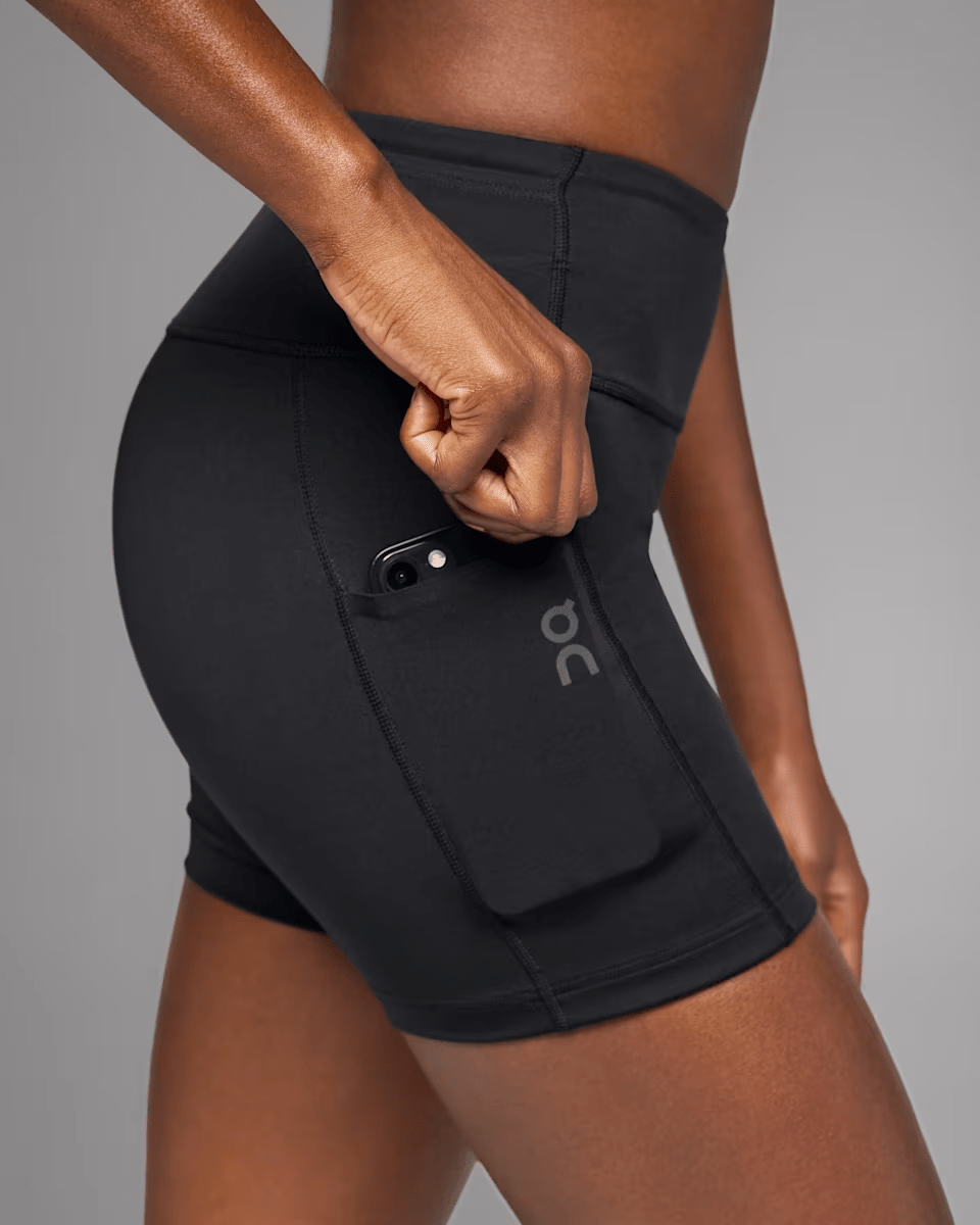 On Running Women's Performance Short Tights in Black - side view pocket detail